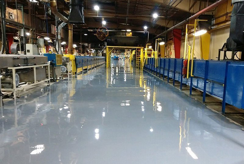 Professional industrial epoxy flooring cost-effective finish for large Newcastle factories and distribution centers.